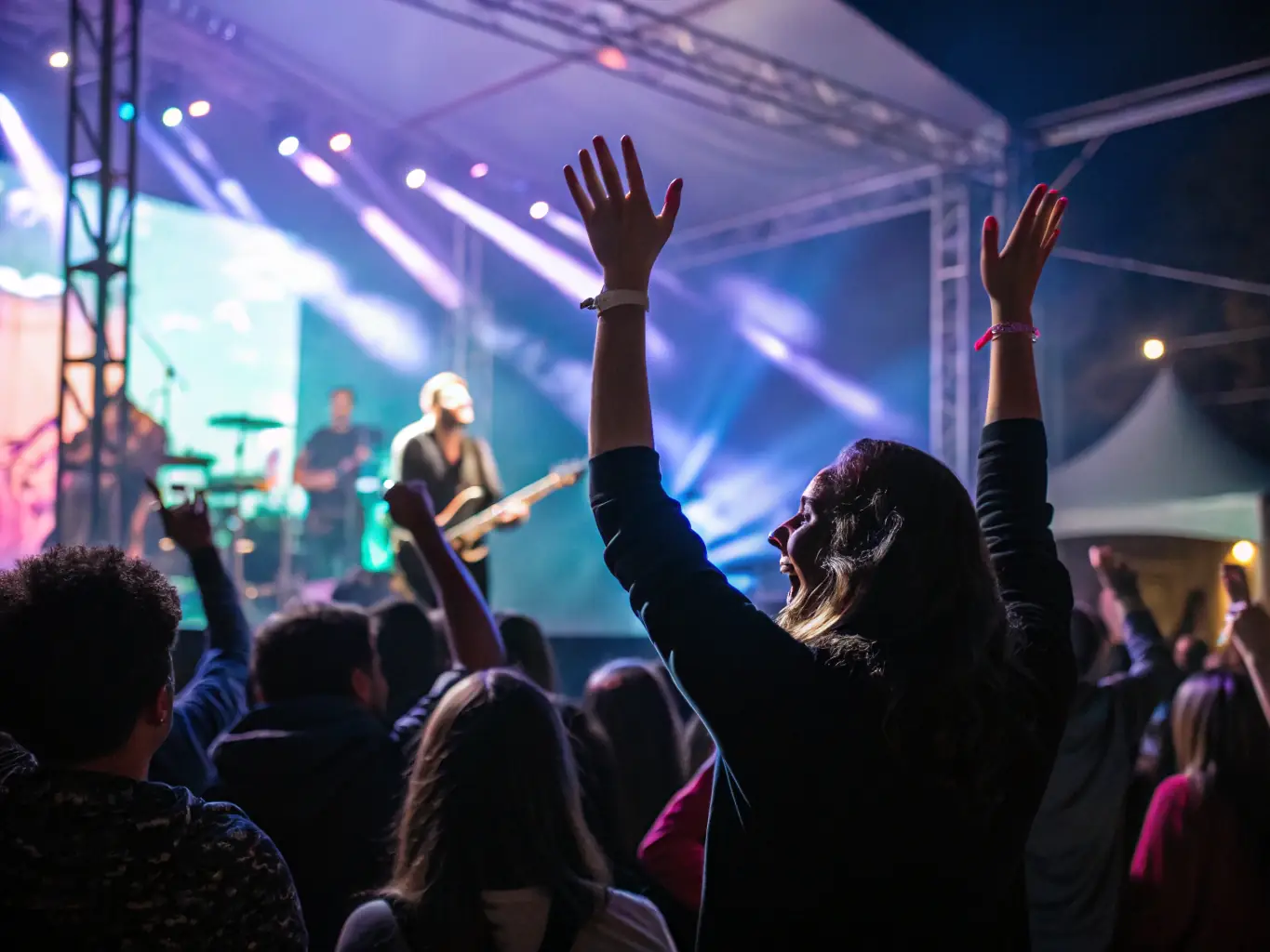 A photograph capturing a diverse audience enjoying a performance at an accessible venue, highlighting the inclusive nature of the event.